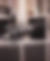A black microphone extended for someone to speak into
